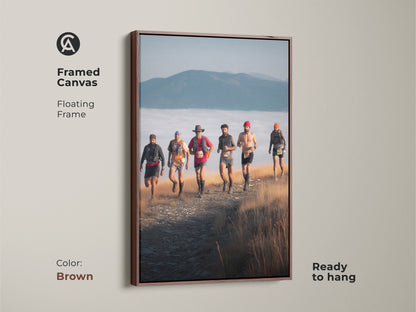 Brown framed canvas showing a group of trail runners ascending a mountain. This adventure photography art is a great gift for outdoor enthusiasts. This rustic wall decor is ready to hang and captures the spirit of the great outdoors. The earth tones complement any room.