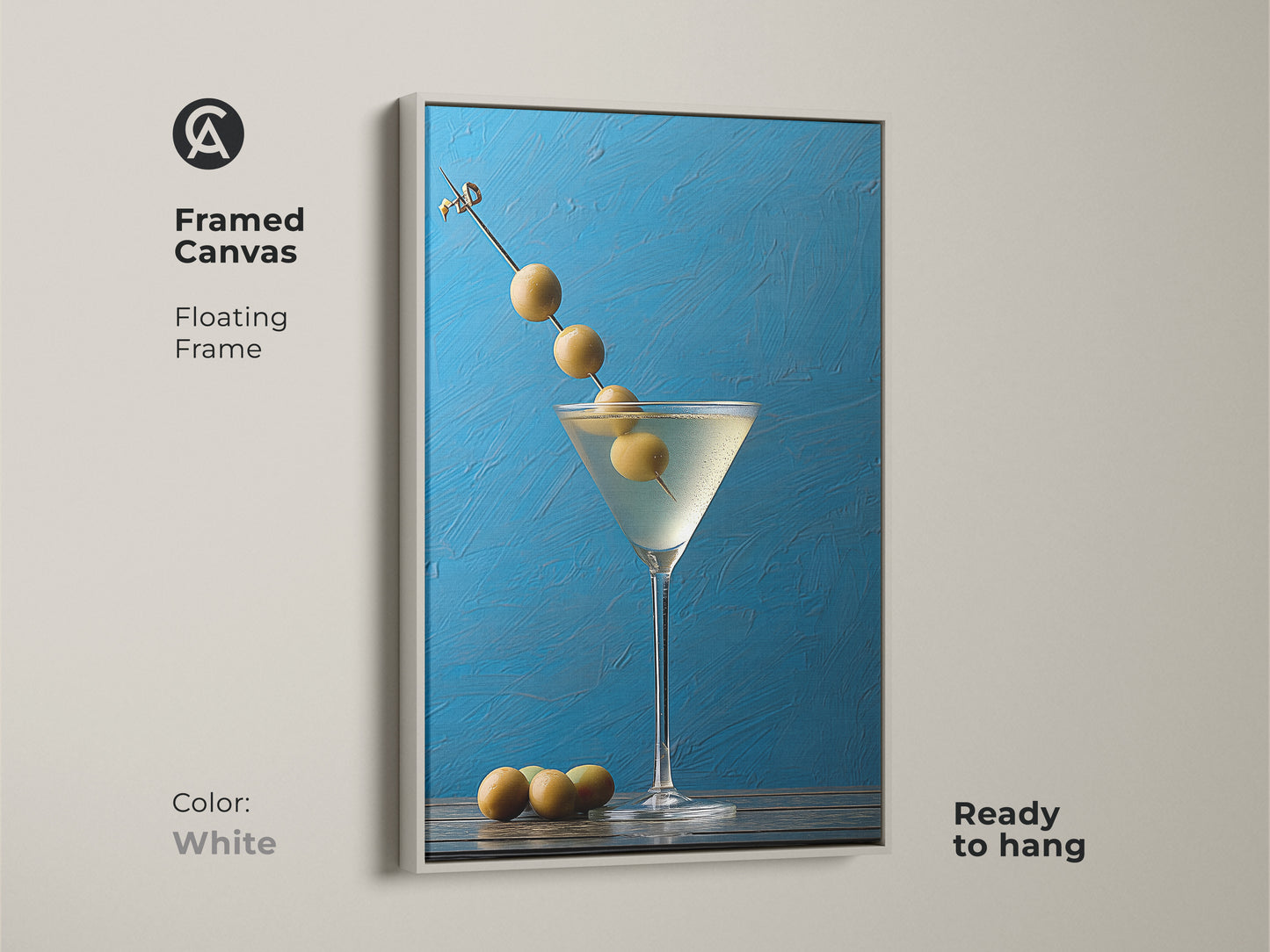 Framed canvas with a white floating frame displaying a martini glass art. Contemporary gift for minimalist bar art. This still life artwork is ready to hang. Modern kitchen decor with an azure blue background. Perfect for stylish bar wall art and home bar decoration.