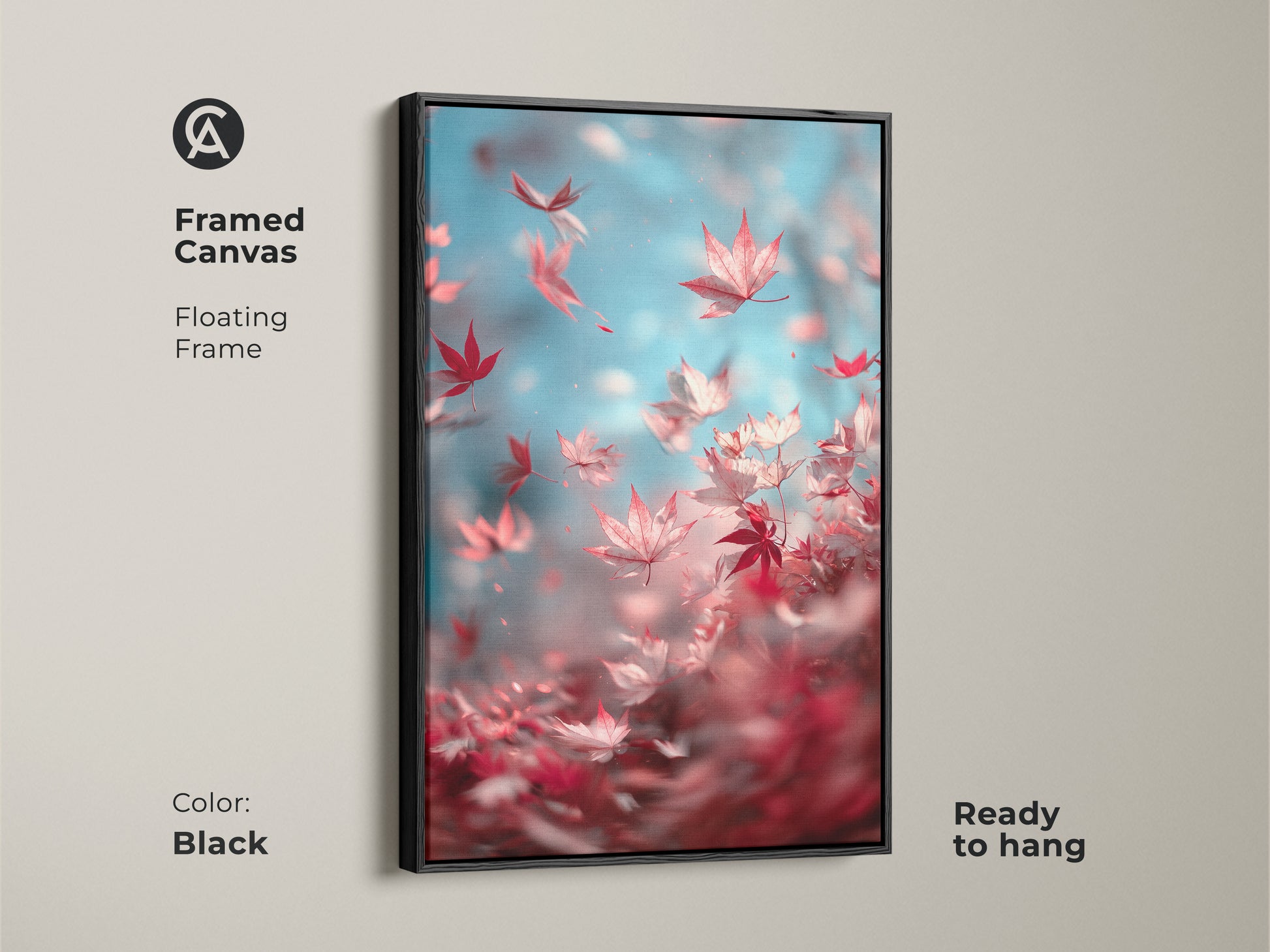 Framed canvas artwork displaying red maple leaves against a light blue sky. The floating frame is black in color. This eye-catching art print is ready to hang and complements modern interiors.