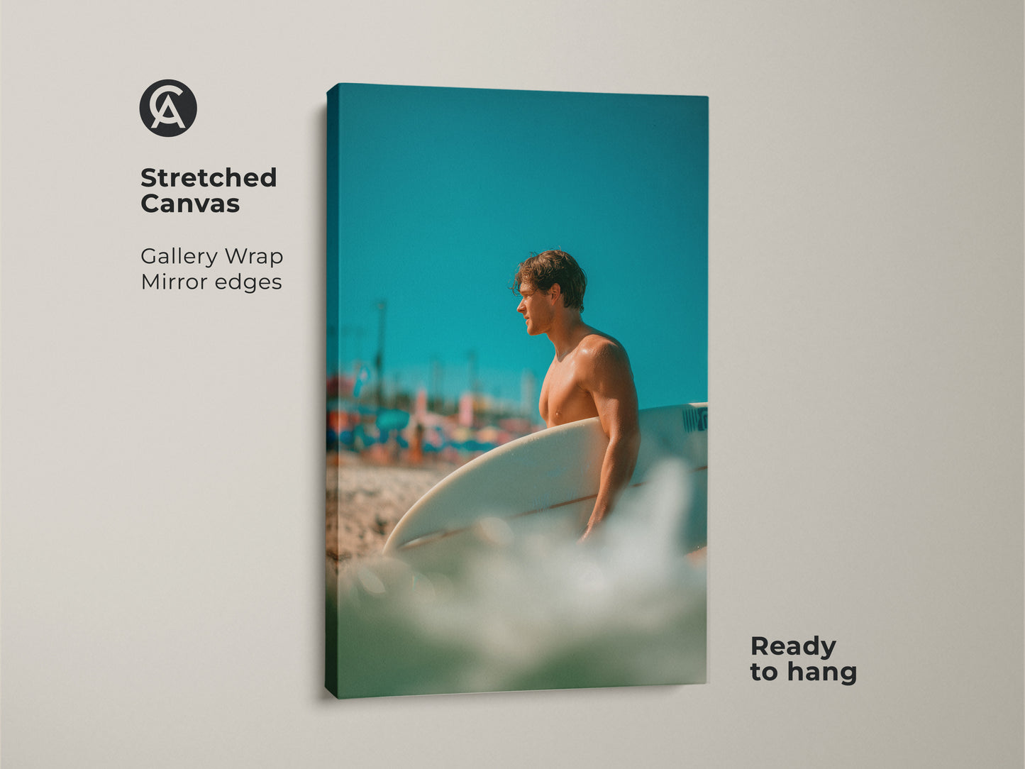 Stretched canvas artwork of a surfer on a beach. Gallery wrap with mirror edges. The image shows a man holding a surfboard with a blue sky. This canvas is ready to hang and enjoy. 