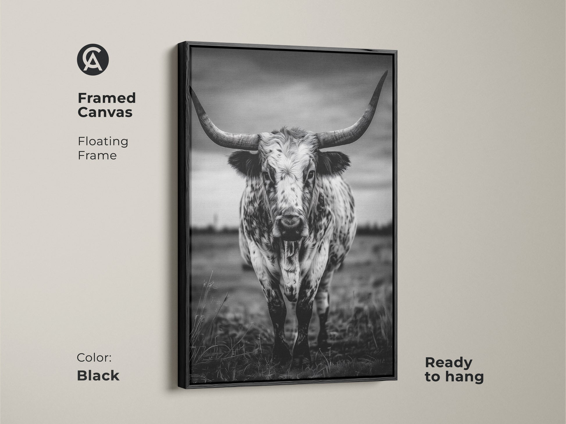 Framed canvas featuring a black and white Texas Longhorn in a floating black frame. This ready-to-hang animal portrait canvas adds character to entryways living rooms or home offices. The rustic ranch decor complements farmhouse or minimalist interiors. It brings a touch of the wild west to any residential space making it an excellent housewarming gift.