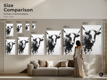 This size comparison shows a black and white bull painting in different sizes. See how the artwork looks above a couch. Each size makes a statement. This artwork will enhance your space. Choose the perfect size for your needs.