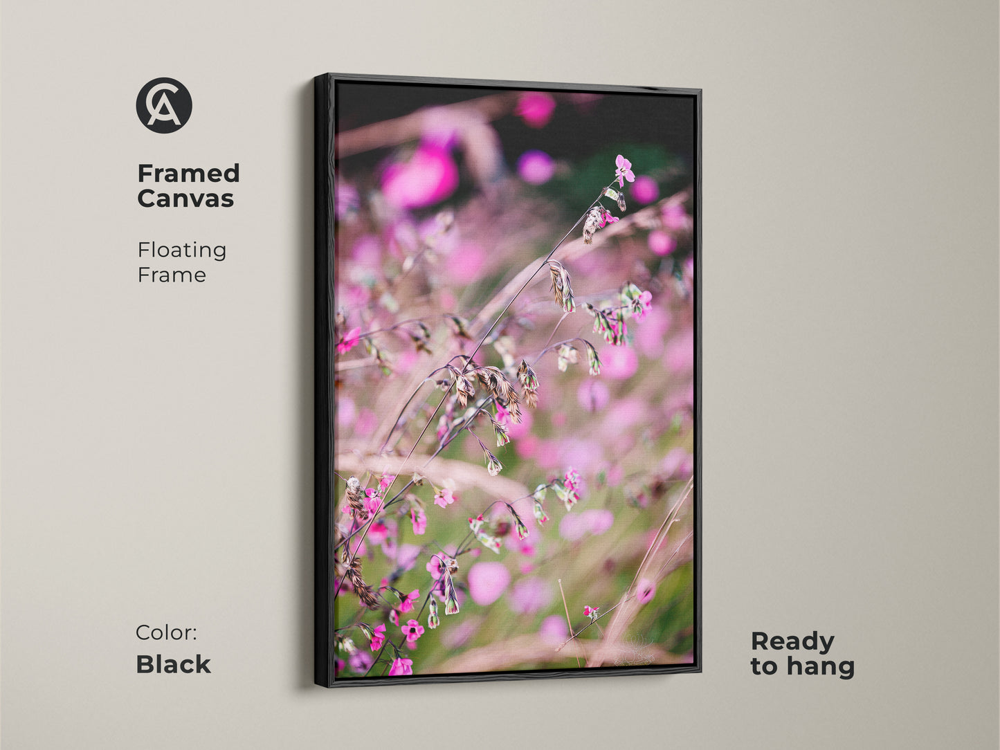 Framed canvas showcasing a pink wildflower macro photo. Floating frame in black enhances the modern boho wall art. This nature art is ready to hang. Perfect for adding a serene touch as bedroom canvas art.