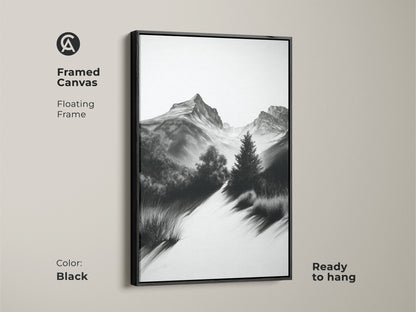 Framed canvas showcasing monochrome mountain artwork with a floating black frame. This black and white landscape art offers a rustic home decor touch. Ready to hang for easy wall display.