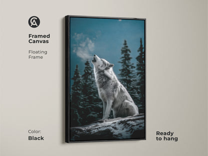 Framed canvas with a black floating frame showing a wolf howling. This winter forest wall art is ready to hang. The gray blue nature decor brings the outdoor scene indoors. Ideal animal habitat art for a cabin living room. A gift for wolf enthusiasts.