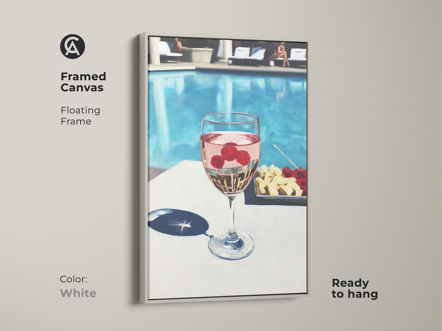 Framed canvas art in white featuring a poolside raspberry rosé drink. Floating frame complements the contemporary artwork. Ready to hang this piece brings a fresh vibe to dining or bar decor. Modern wall art for wine lovers.