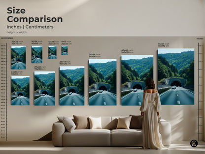 Size comparison of Green Forest Tunnel art in inches and centimeters. This wall art shows canvas and poster prints. Various sizes are available to fit any wall. A woman stands next to the art above the couch for scale. This automotive themed art is perfect road trip decor. Great gift for car enthusiasts