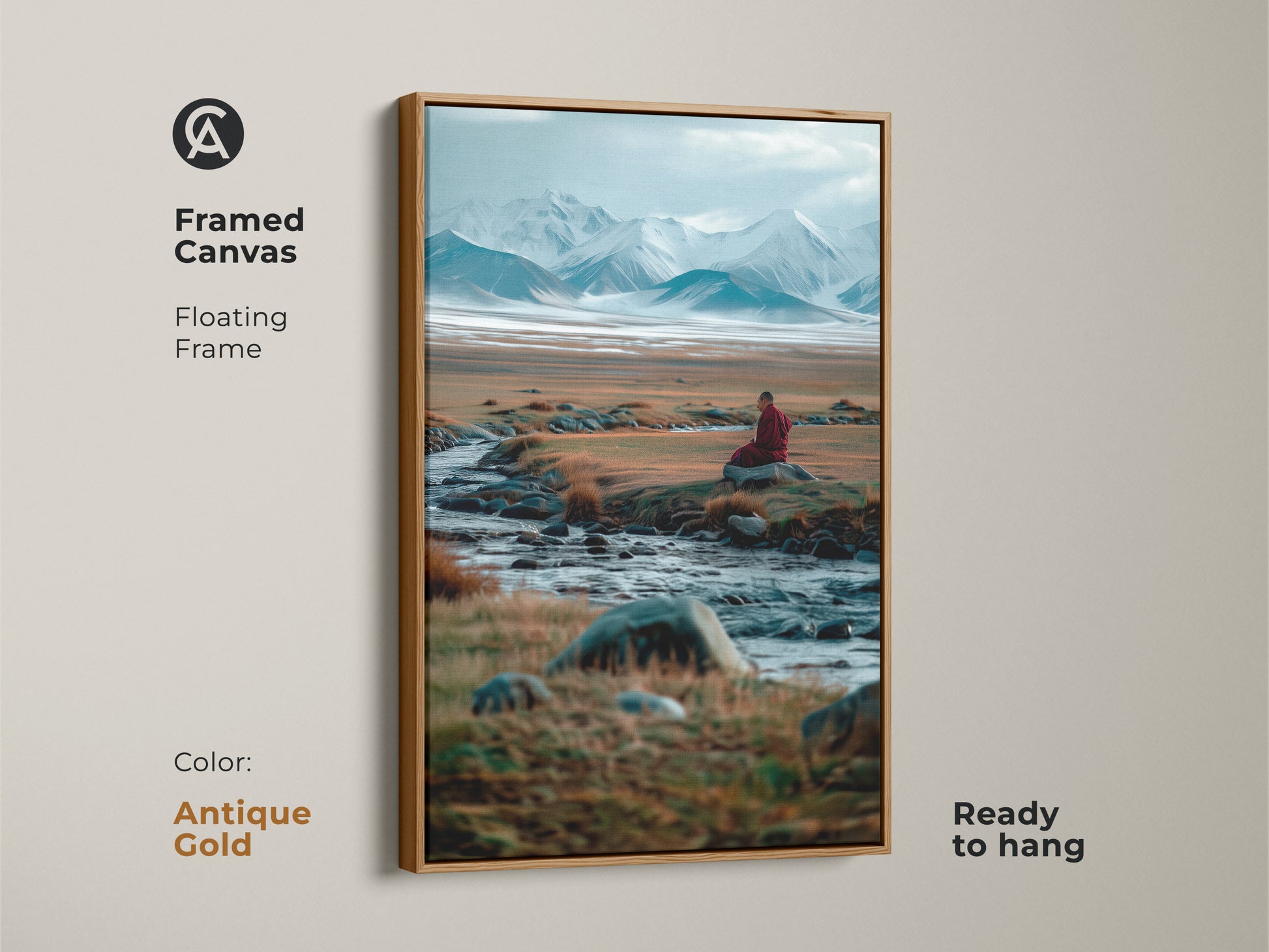 Antique gold framed canvas art showcasing a peaceful mountain scene. The artwork includes a monk meditating by a stream. The floating frame is ready to hang. This artwork brings tranquility to any room.