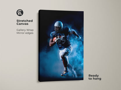 A stretched canvas gallery wrap features a football player in action. This navy and white sports print is ready to hang. It's ideal for adding a dynamic touch to a man cave or office. The athlete action artwork makes a great gift for sports fans.