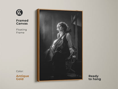 Framed canvas art print of a cellist in black and white. This contemporary artwork features an antique gold floating frame. Ready to hang adding a touch of sophistication to any wall. Perfect for a music room or home studio. The portrait is a great gift for musicians.