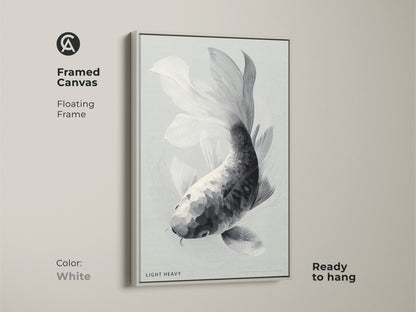 Framed canvas art showcasing a monochrome koi fish. The floating frame is white. This ready to hang artwork offers a clean modern look. The simple color palette complements any room. Bring minimalist elegance to your decor with this fish art.