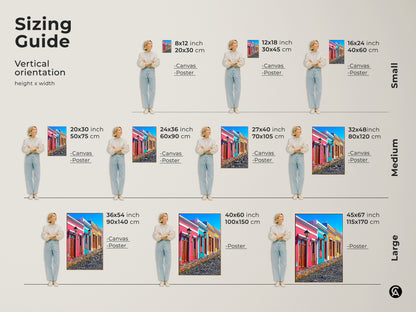 A sizing guide for vertical orientation cityscape art prints is shown. Sizes range from small 8x12 to large 45x67 prints on canvas or poster. Find the perfect fit for your space with this colorful houses wall art. Ideal for eclectic decor this cartoonish travel artwork suits any room. Gift travel lover art.