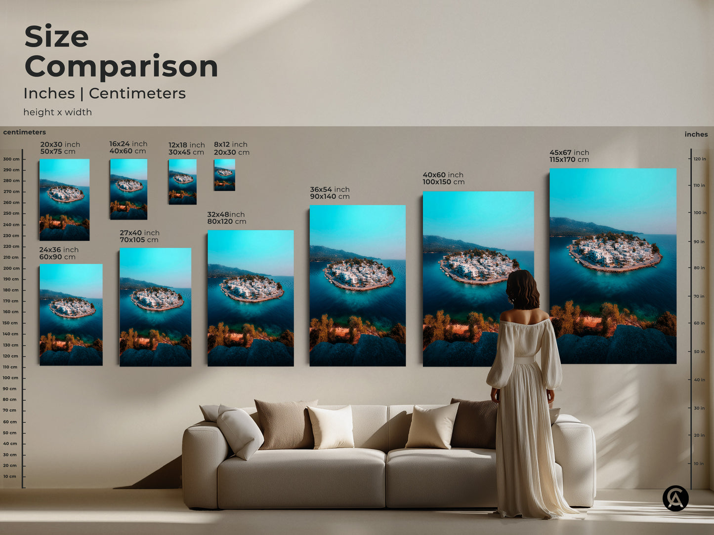 Compare sizes of this coastal island village art print in inches and centimeters. Visualize how the artwork fits above a sofa showcasing its impact in different dimensions. Perfect for modern coastal decor and a travel lover gift this aerial view artwork brings a Mediterranean seaside town to your space.
