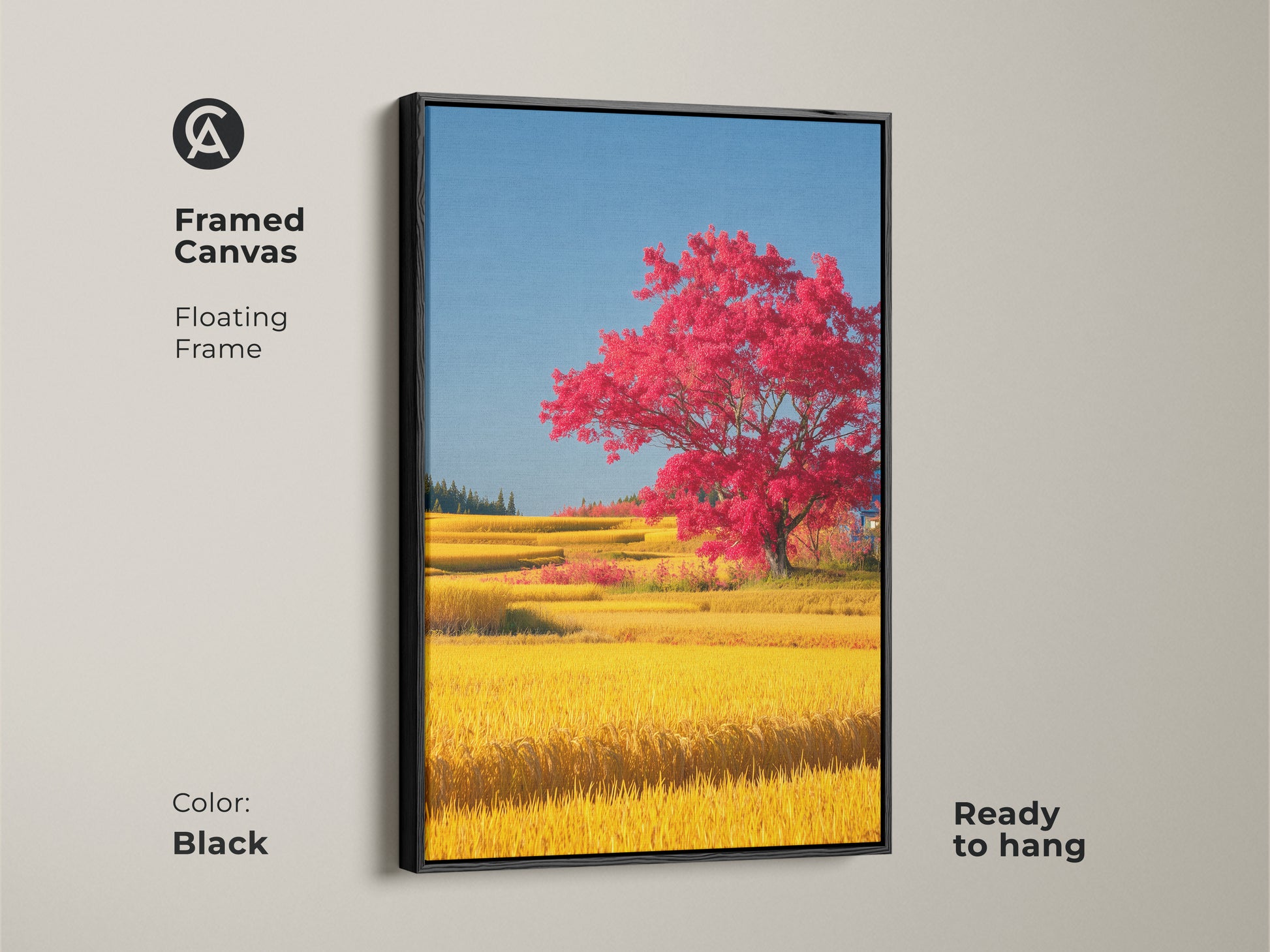 Framed canvas featuring a red tree in a yellow rice field with a black floating frame. This scenic landscape artwork is ready to hang and enhances any room. The nature lover gift idea brings the beauty of the countryside to your home adding an eclectic touch to your wall decor.