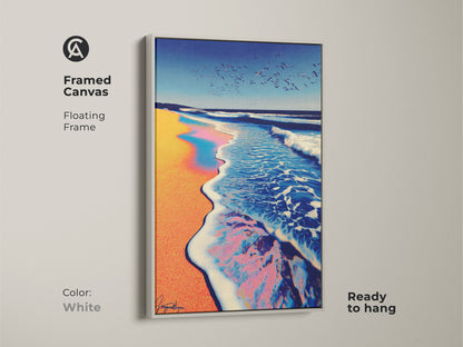 Framed canvas featuring an ocean wave at sunset. The coastal art in a white floating frame provides modern style and is ready to hang. The artwork is a captivating focal point for a living room or office. Teal blue and orange artwork for any decor theme.