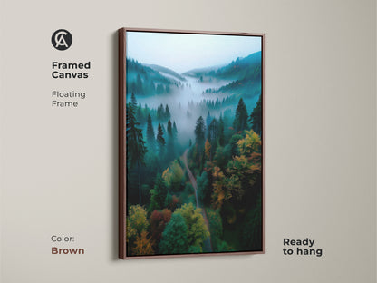 A framed canvas displays misty forest artwork. It has a brown floating frame. This ready to hang nature scene enhances any room. The artwork brings a tranquil forest view to your home.