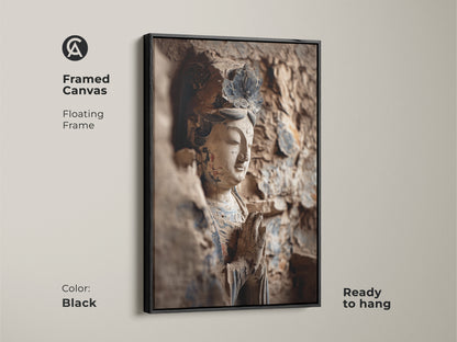 A framed canvas presents a Buddha statue artwork. The floating frame is black. The zen buddhist art print is ready to hang. It's an ideal eclectic home decor gift.