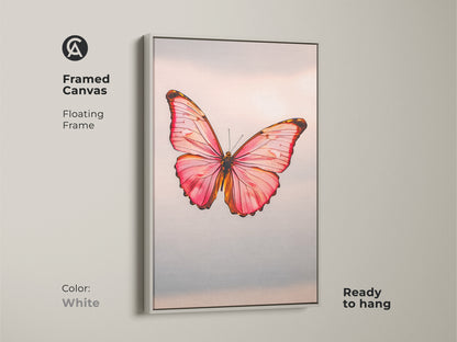 Framed canvas with a floating frame showcasing insect art. The modern nature canvas is ready to hang. The minimalist butterfly decor comes in white. The pink butterfly artwork is a rose gold butterfly print.
