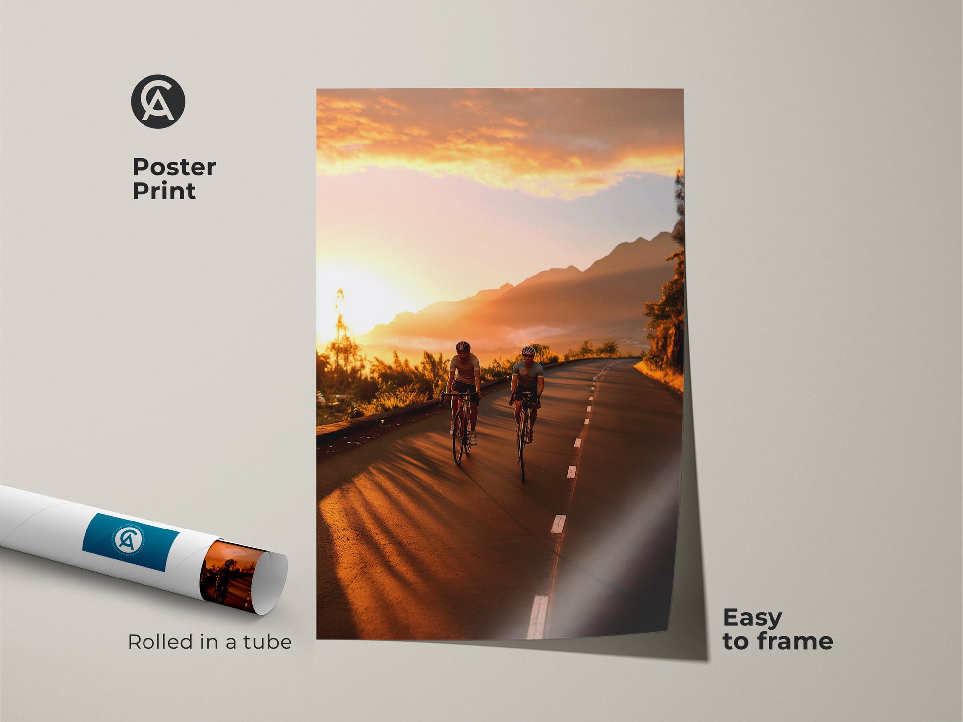 Poster print of a mountain road sunset featuring cyclists. Rolled in a tube and easy to frame. This cycling wall art captures a scenic route in warm yellow and orange hues. Great for motivational wall art and travel photography lovers. Enhance your decor today.