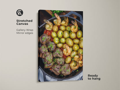 A stretched canvas gallery wrap shows steak and shrimp skillet artwork. The mirror edges add a modern touch to this comfort food print. Ready to hang this piece is perfect for rustic kitchen decor. It is a great housewarming gift for any home cook.