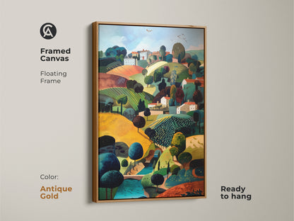 Framed canvas print of a folk naive style countryside village. The golden emerald and teal artwork features an antique gold floating frame. This travel inspired wall decor is ready to hang. It's a pastoral scene canvas and a housewarming gift for eclectic home decor.