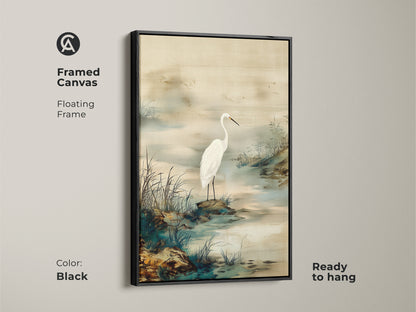 Black framed canvas showcases an Egret bird. Japandi style wall art presents a minimalist landscape. An ink wash egret painting with beige and green accents. Ready to hang fine art print.