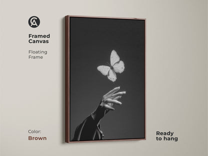 Framed canvas features a floating frame with a brown frame. Black and white abstract art. It shows an insect and human touch. Contemporary bedroom decor. Makes an elegant living room canvas or a nature lover gift.
