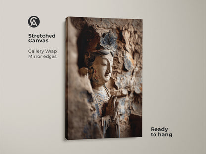 A stretched canvas displays a Buddha statue artwork. The gallery wrap features mirror edges. Ready to hang this zen buddhist art print. It will bring peace to any space.