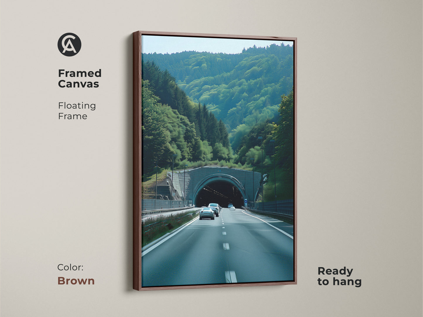 A framed canvas with a brown floating frame shows the Green Forest Tunnel art. Ready to hang scenic art print. It is a contemporary road trip art and realistic car photography piece. This travel destination canvas will suit car lovers. Perfect automotive themed wall art and a unique travel gift.