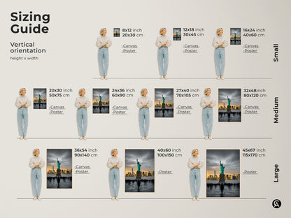 This vertical sizing guide shows the different sizes available for this artwork. You can choose from small medium or large sizes. The art features the Statue of Liberty and the New York City skyline. Find the perfect size for your space today.