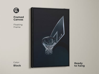 Framed canvas basketball hoop art with a floating black frame. This contemporary sports art is ready to hang. The artwork adds a sophisticated touch to any space for basketball fans.