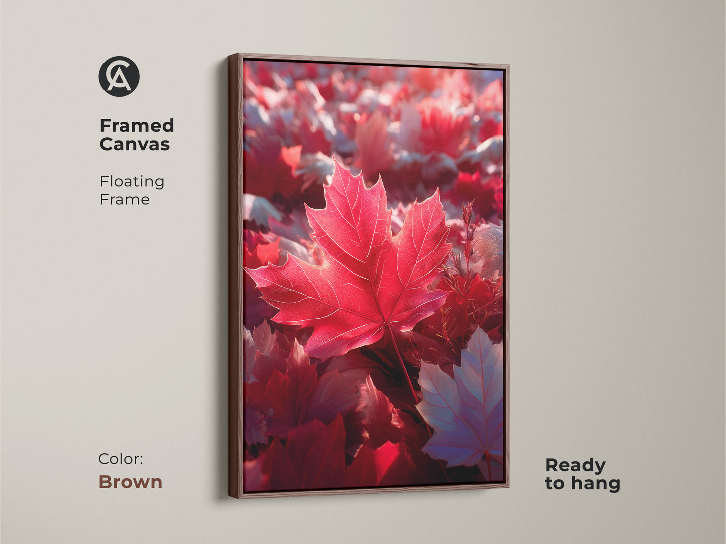 Brown framed canvas art featuring a red maple leaf. The artwork has a floating frame and is ready to hang. It's a warm and inviting piece of wall art for any home decor. This framed print captures the beauty of autumn.
