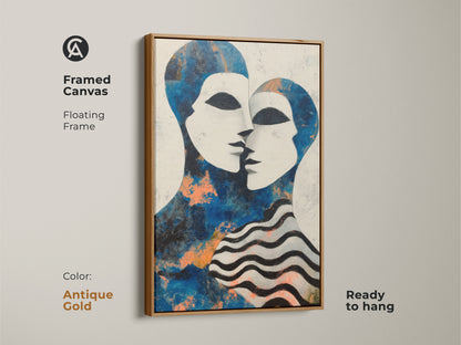 A stylish contemporary abstract couple art print. The blue and white figurative faces canvas is framed in black. It's a great anniversary gift for couples. The artwork enhances any eclectic home decor setting with its modern feel.