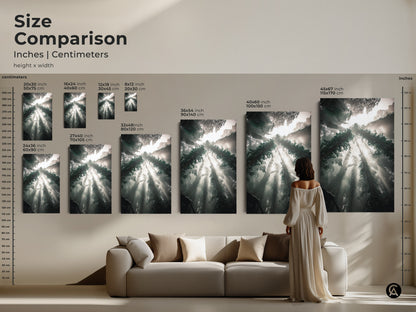 Compare sizes of this misty trees sunbeam canvas print in inches and centimeters. Visualize this teal gray green biophilic nature landscape artwork above your sofa. Transform your living space with this captivating atmospheric jungle print.