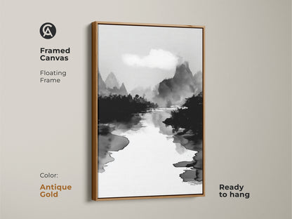 Framed canvas in antique gold featuring a black white ink wash art print. A minimalist mountain river landscape canvas complements modern nature prints. The Japanese Sumi-e style artwork adds a touch of Asian-inspired wall art. Perfect for creating a serene and stylish atmosphere.