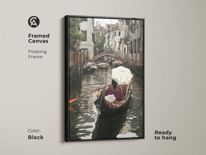 Framed canvas featuring a Venice gondola watercolor art print. This Italian cityscape wall art includes a floating black frame and is ready to hang. The teal and brown artwork showcases a romantic European canal scene perfect for residential decor.