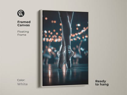 This framed canvas art highlights a ballerina's feet in pointe shoes. The clean white floating frame provides a modern look. Ready to hang this artwork will brighten any room. Perfect for ballet art collectors and enthusiasts.