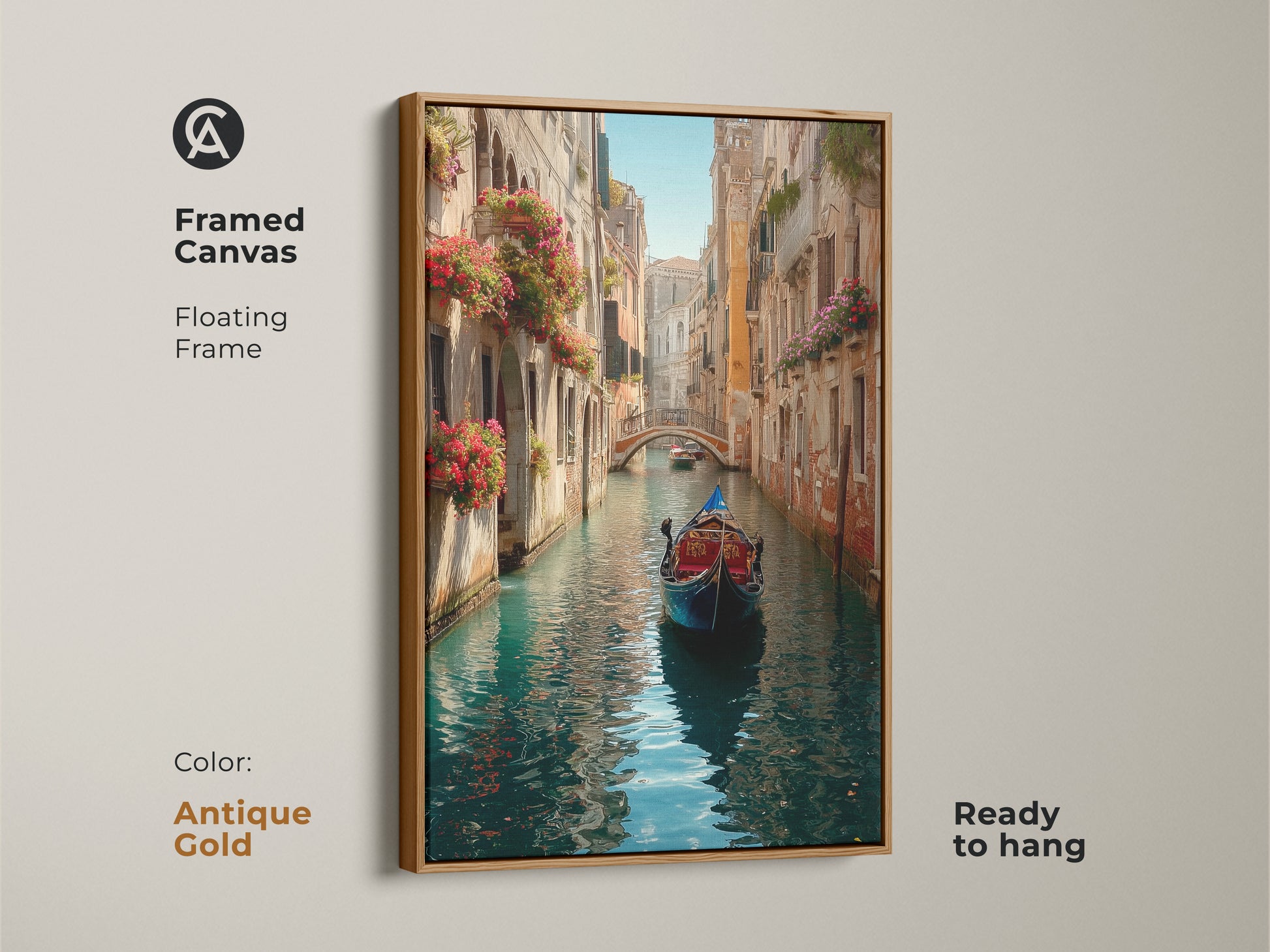 Bring a touch of Venice to your walls with this framed canvas. A gondola is shown on a canal lined with old buildings. Red flowers cascade from window boxes adding color. The antique gold floating frame adds vintage charm. Ready to hang instantly.