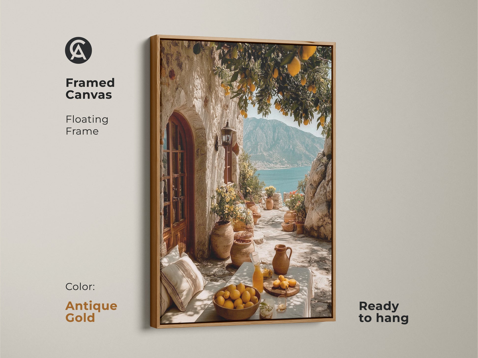 Framed Canvas featuring Mediterranean Lemon Tree art in an antique gold floating frame. The artwork shows a coastal village scene with yellow lemons and blue sea. Perfect travel lover housewarming gift.