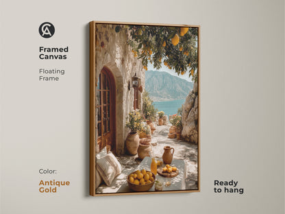 Framed Canvas featuring Mediterranean Lemon Tree art in an antique gold floating frame. The artwork shows a coastal village scene with yellow lemons and blue sea. Perfect travel lover housewarming gift.