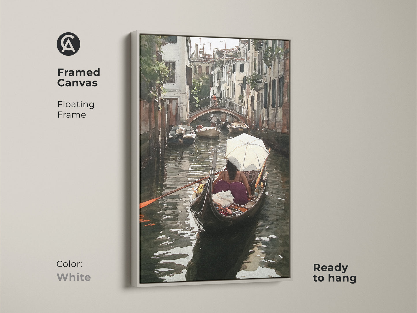 Framed canvas featuring a Venice canal watercolor artwork. This Italian cityscape wall art has a floating white frame and is ready to hang. The teal and brown artwork depicts a gondola boat scene ideal for boutique hotel art or unique cityscape artwork.
