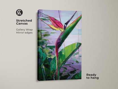 Stretched canvas featuring an abstract Bird of Paradise artwork. This tropical botanical canvas print has gallery wrap with mirror edges. Ready to hang art brings boho vibes to your home. Green pink and purple colors make it a vibrant housewarming gift. Perfect for plant and nature enthusiasts.