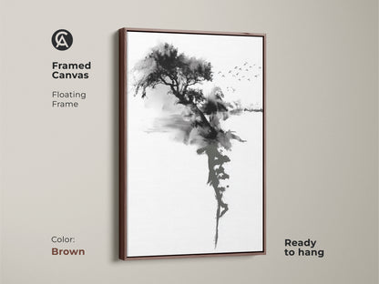 Brown framed canvas featuring Ink Wash Tree art print. The minimalist black and white Sumi-e landscape creates a zen ambiance. Birds fly over this peaceful nature wall decor. Ready to hang in your bedroom.