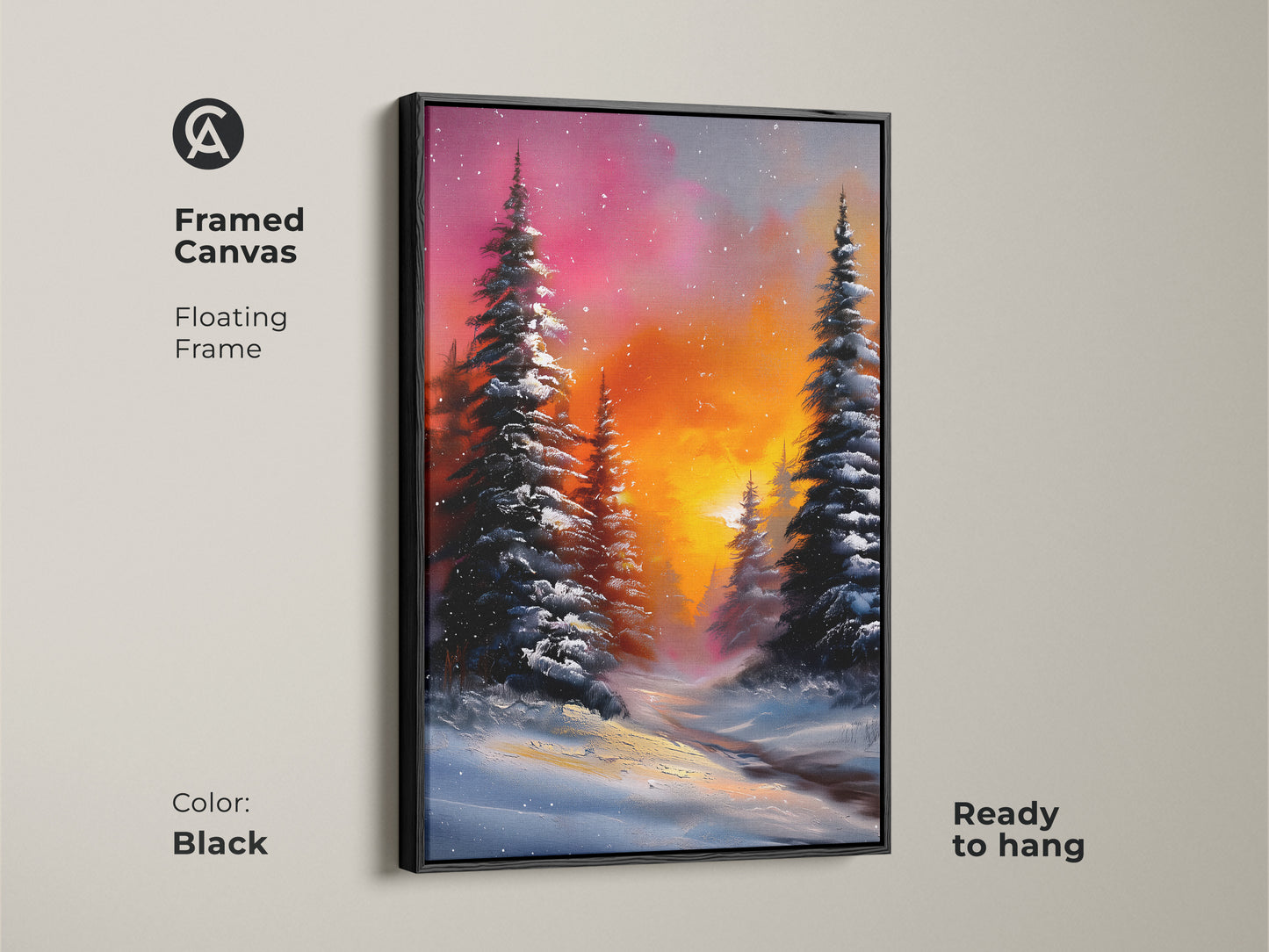 Framed canvas of a rustic winter landscape. A black floating frame enhances the snowy pine tree print. Ready to hang and perfect for country style home decor. The orange and pink sky adds a touch of warmth.