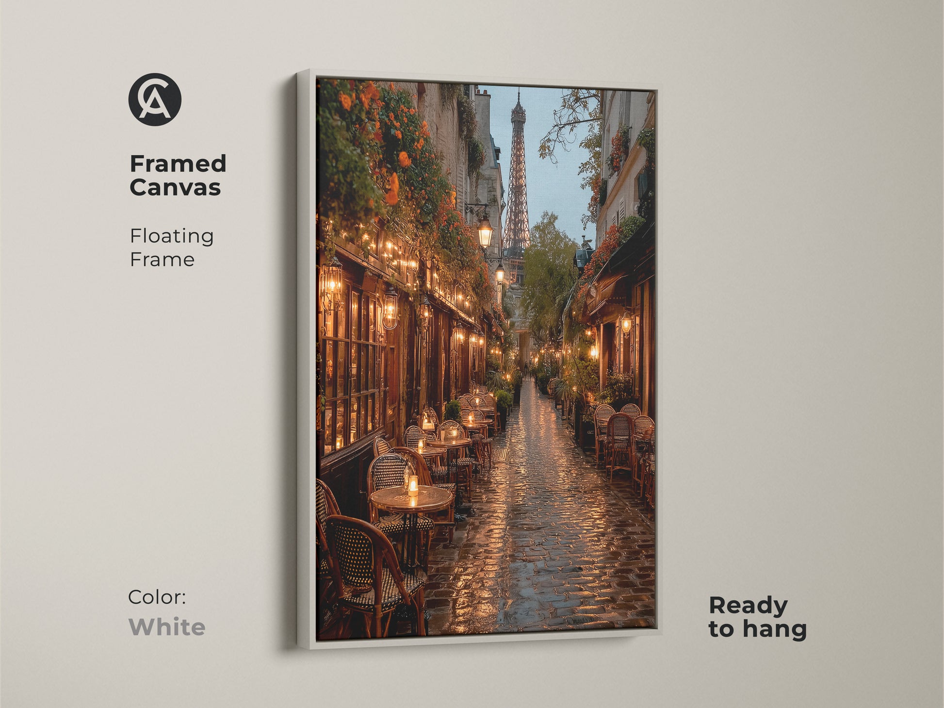 Framed canvas art of a Paris street scene. The floating frame is white. This artwork captures a rainy evening with the Eiffel Tower. This ready-to-hang canvas offers a clean modern look.