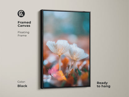 Black framed canvas art of white mushrooms. This floating frame art is ready to hang. The nature artwork adds a touch of beauty. The canvas print is a stunning addition to any room. It enhances your space.