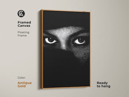 Antique gold framed canvas with monochrome eyes wall art. The abstract face canvas print shows minimalist portrait art. Black and white bedroom decor makes for contemporary living room art. High contrast artwork offers a modern abstract print. This mystery themed art is ready to hang.