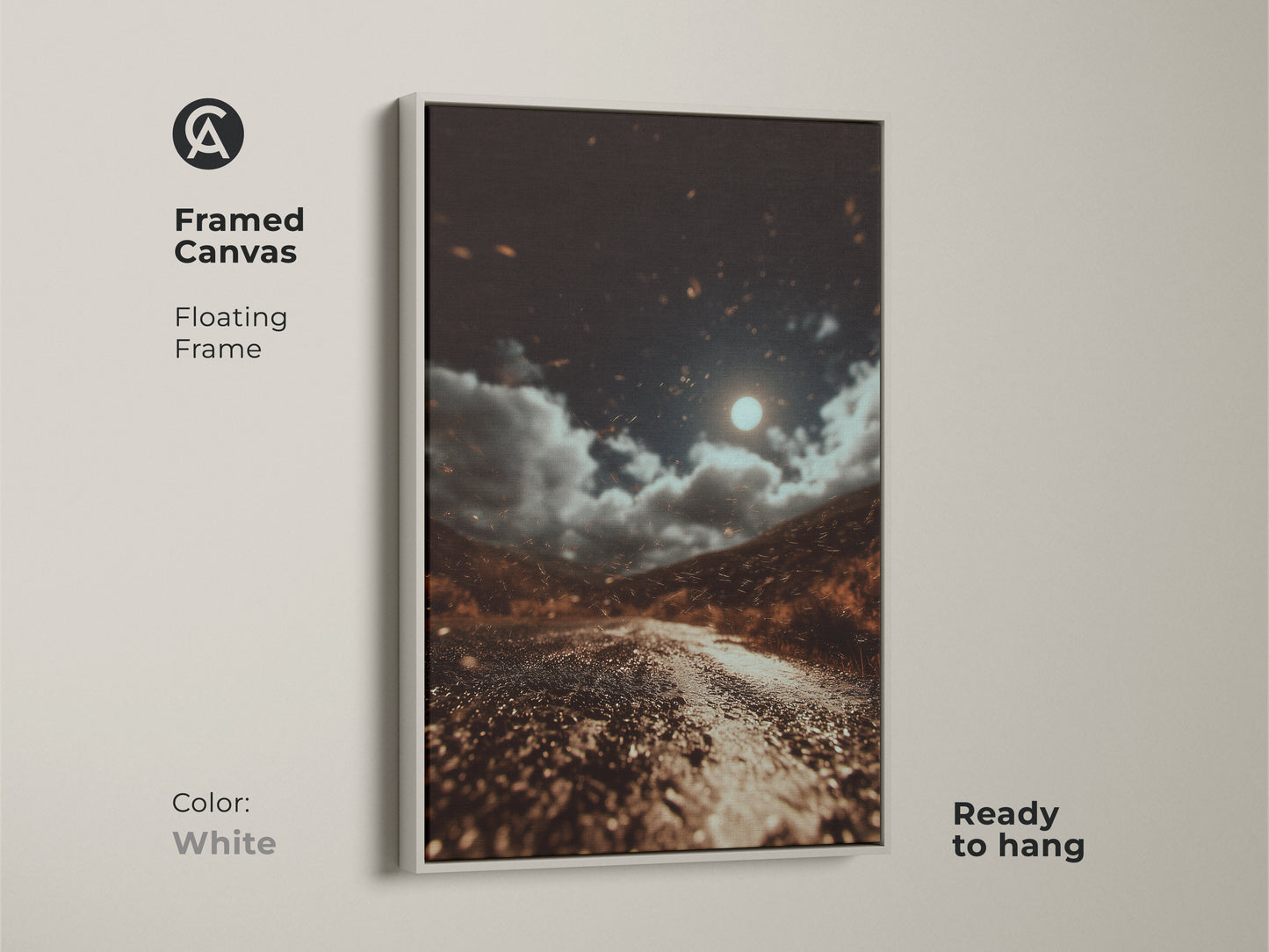 Framed in white this canvas features a moonlit road. The dark brown landscape artwork has gray and orange accents. It's an eclectic home decor piece ready to hang. This nature wall art print captures a celestial night sky. The cinematic road trip artwork brings a moody landscape. Perfect for travel lovers.