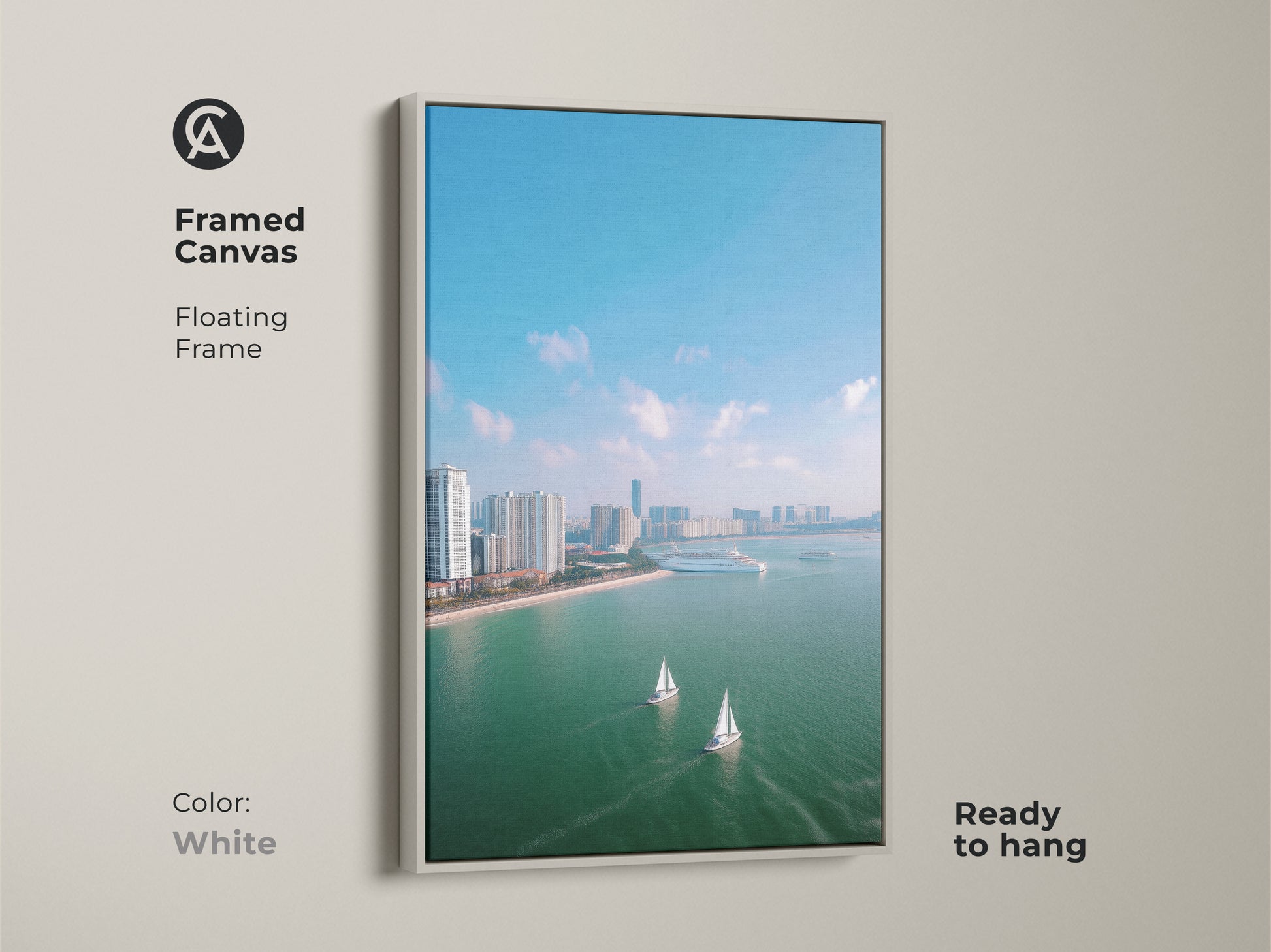 Framed canvas print featuring an aerial cityscape with sailboats. The ocean view artwork is set in a white floating frame. The modern travel art is ready to hang showcasing a city skyline in teal blue tones. This coastal decor canvas brings a contemporary style to any room. Perfect for nautical home decor.
