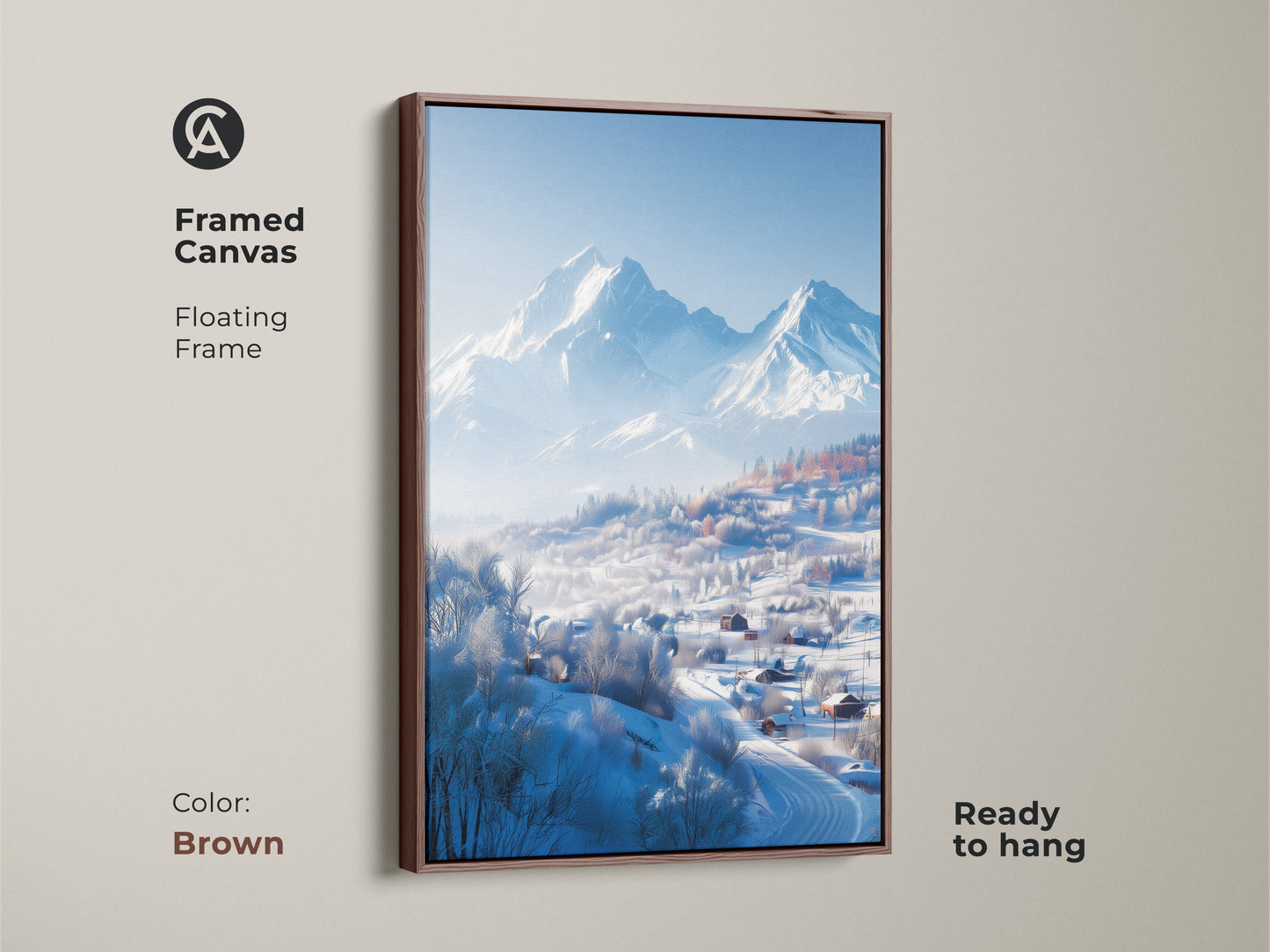 This framed canvas print features a winter mountain scene. A brown floating frame enhances the artwork. The print shows snow-covered houses nestled in a valley. Distant mountains add to this ready-to-hang piece.